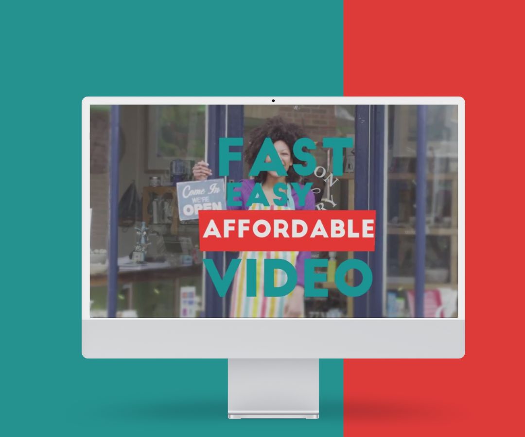 This portfolio displays a computer monitor featuring a storefront scene with bold overlay text reading “Fast, Easy, Affordable Video.” The split teal and red background enhances contrast, drawing attention to the screen and its message.