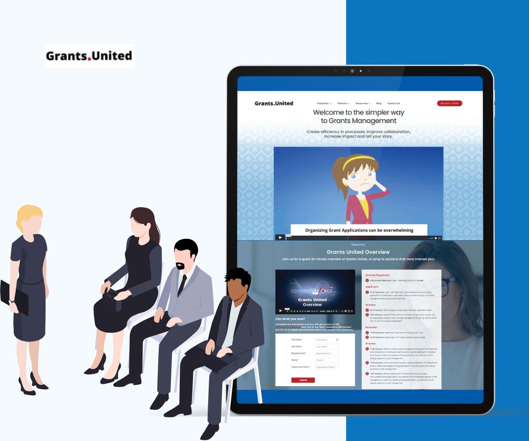 People in business casual attire, including blouses, long sleeve tops, slacks, skirts, and office shoes, sitting and standing beside a large tablet displaying a website interface in a clean blue themed layout.